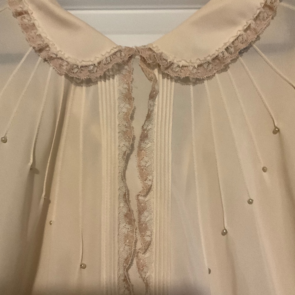 And 1930s, 1940s blouse